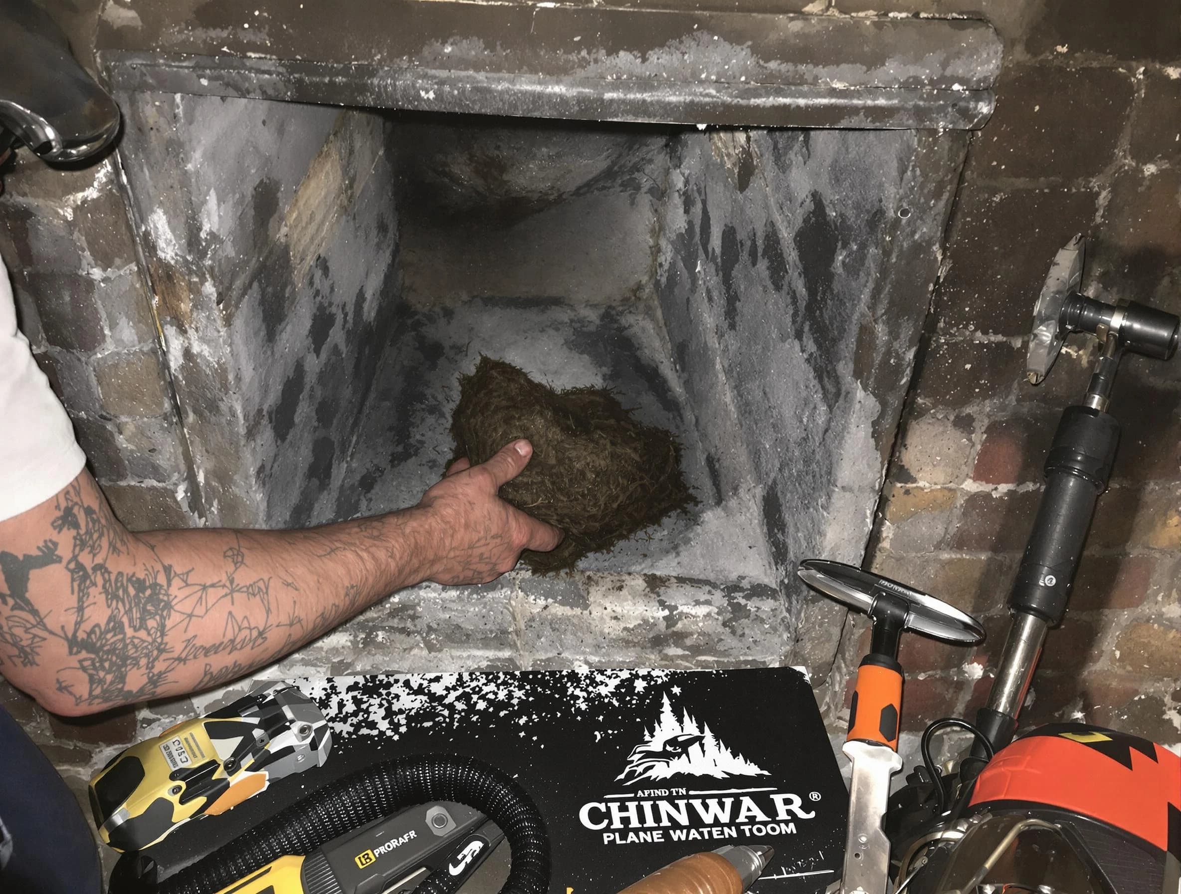 Loganville Chimney Sweep safely removing debris and screening chimney in Loganville, GA